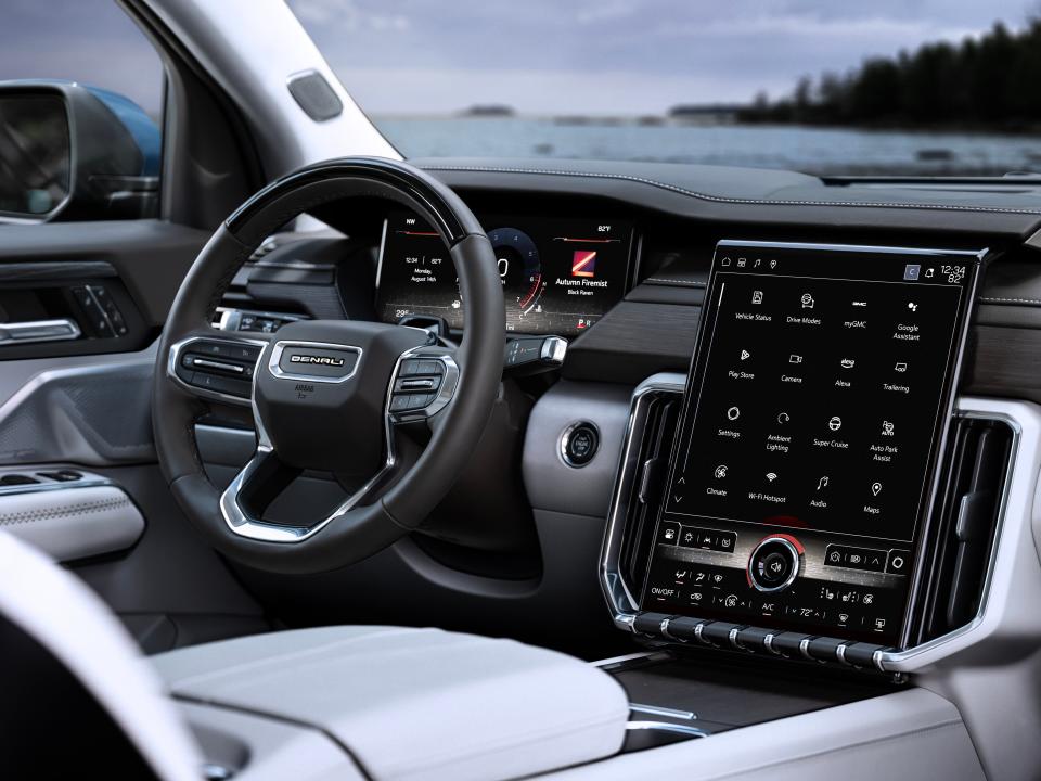 The 2024 GMC Acadia Denali SUV has a 15-inch portrait-orientation touch screen, physical controls for volume and some climate functions and satellite controls on the steering wheel.