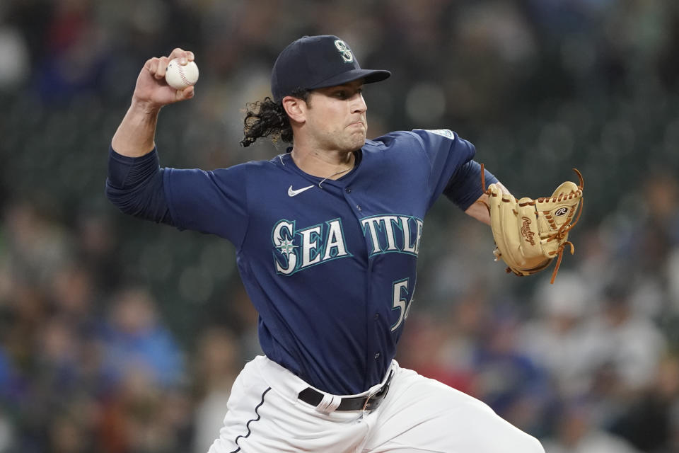 Seattle Mariners starting pitcher Penn Murfee throws to a Los Angeles Angels batter during the first inning of the second baseball game of a doubleheader, Saturday, June 18, 2022, in Seattle. (AP Photo/Ted S. Warren)