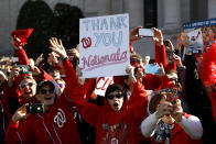 Washington Nationals fans cheer during a parade to celebrate the team's World Series baseball championship over the Houston Astros, Saturday, Nov. 2, 2019, in Washington. (AP Photo/Patrick Semansky)