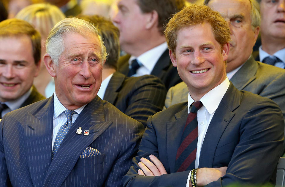 Prince Charles and Prince Harry laugh during the Invictus Games Opening Ceremony on September 10, 2014 in London, England.  / Credit: Chris Jackson / Getty Images