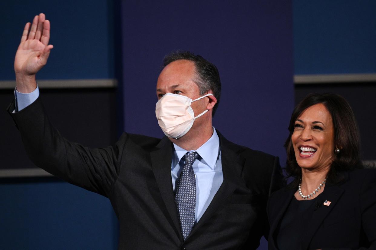 Vice president-elect Harris shares a stage with husband Doug Emhoff during the election campaign (AFP via Getty)