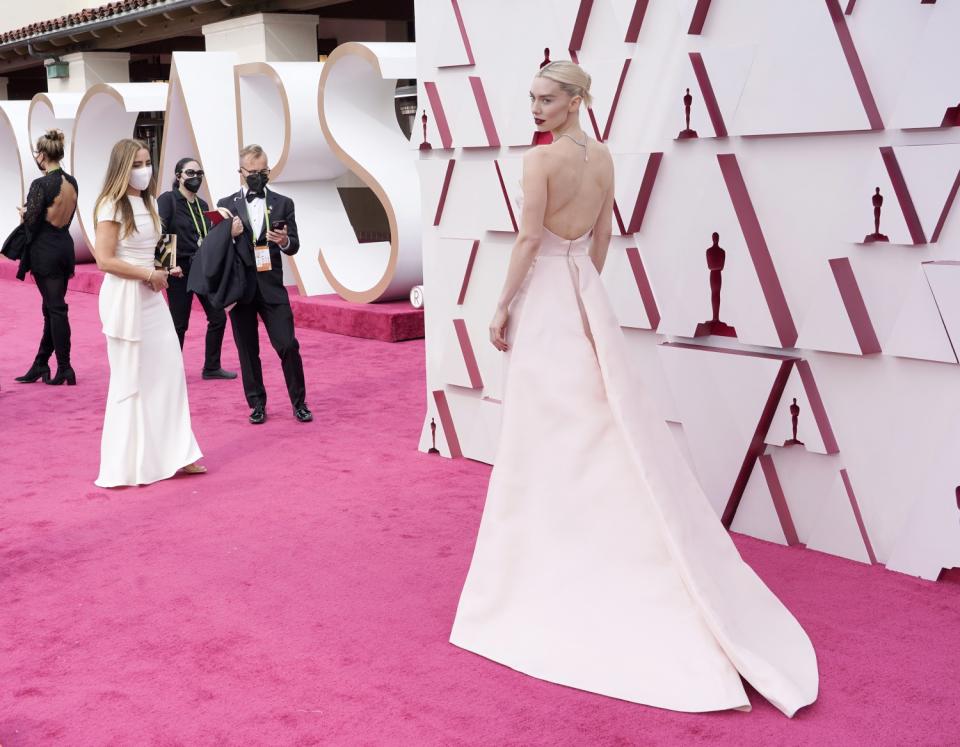 Vanessa Kirby in a backless white dress