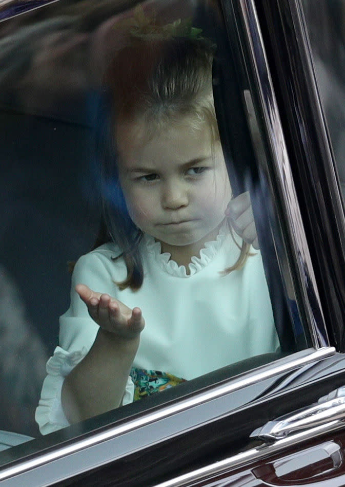 The royal tot reportedly blew a kiss from the car upon arrival at the royal wedding [Photo: Getty]
