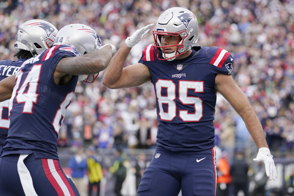 New England Patriots tight end Hunter Henry (85) celebrates after his touchdown as he salutes Kendrick Bourne, left, during the first half of an NFL football game against the Cleveland Browns, Sunday, Nov. 14, 2021, in Foxborough, Mass. (AP Photo/Steven Senne)