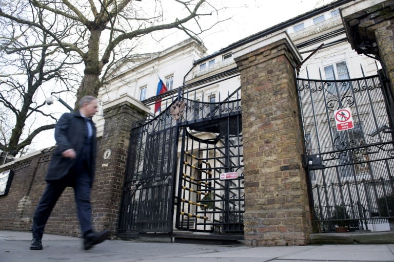 A man walks past The Russian embassy in London