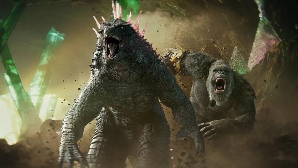 Godzilla and Kong charge the villains.