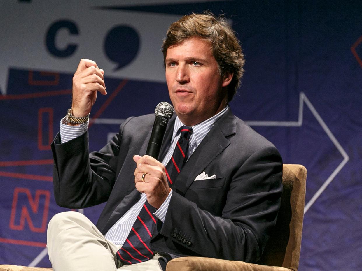 <p>Tucker Carlson has won the praise of the SPLC-designated hate group VDARE</p> (Getty Images for Politicon)