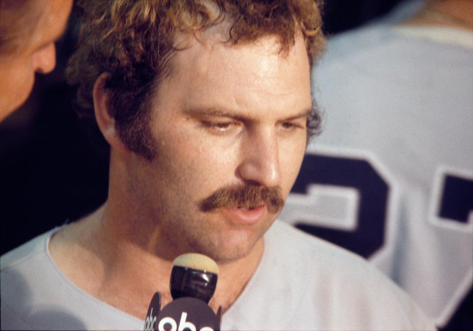 New York Yankees catcher Thurman Munson is interviewed in the locker room following the Yankees' one-game playoff victory over the Red Sox at Fenway Park in Boston, Oct. 2, 1978. The victory made the Yankees the American League East champions.