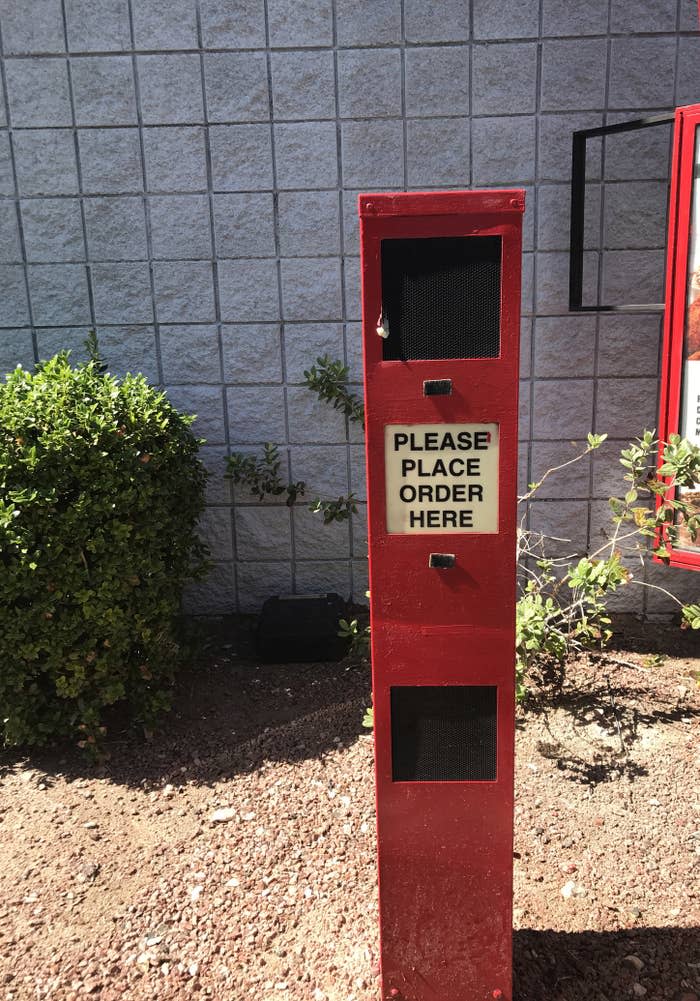 A drive-through speaker box