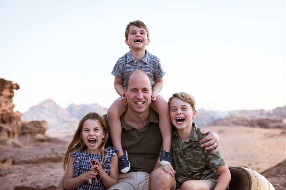 Duke of Cambridge with his children, Prince Louis, Prince George (right) and Princess Charlotte, to mark Father's Day 2022 (PA)