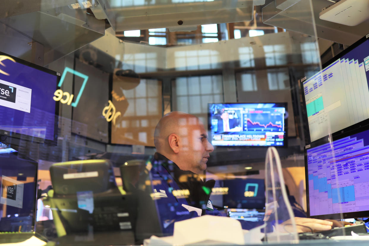 NEW YORK, NEW YORK - MAY 05: Traders work the floor of the New York Stock Exchange during morning trading on May 05, 2022 in New York City. Stocks opened lower this morning after closing high on Wednesday after the Federal Reserve announced an interest-rate hike by half a percentage point in an effort to further lower inflation.  (Photo by Michael M. Santiago/Getty Images)