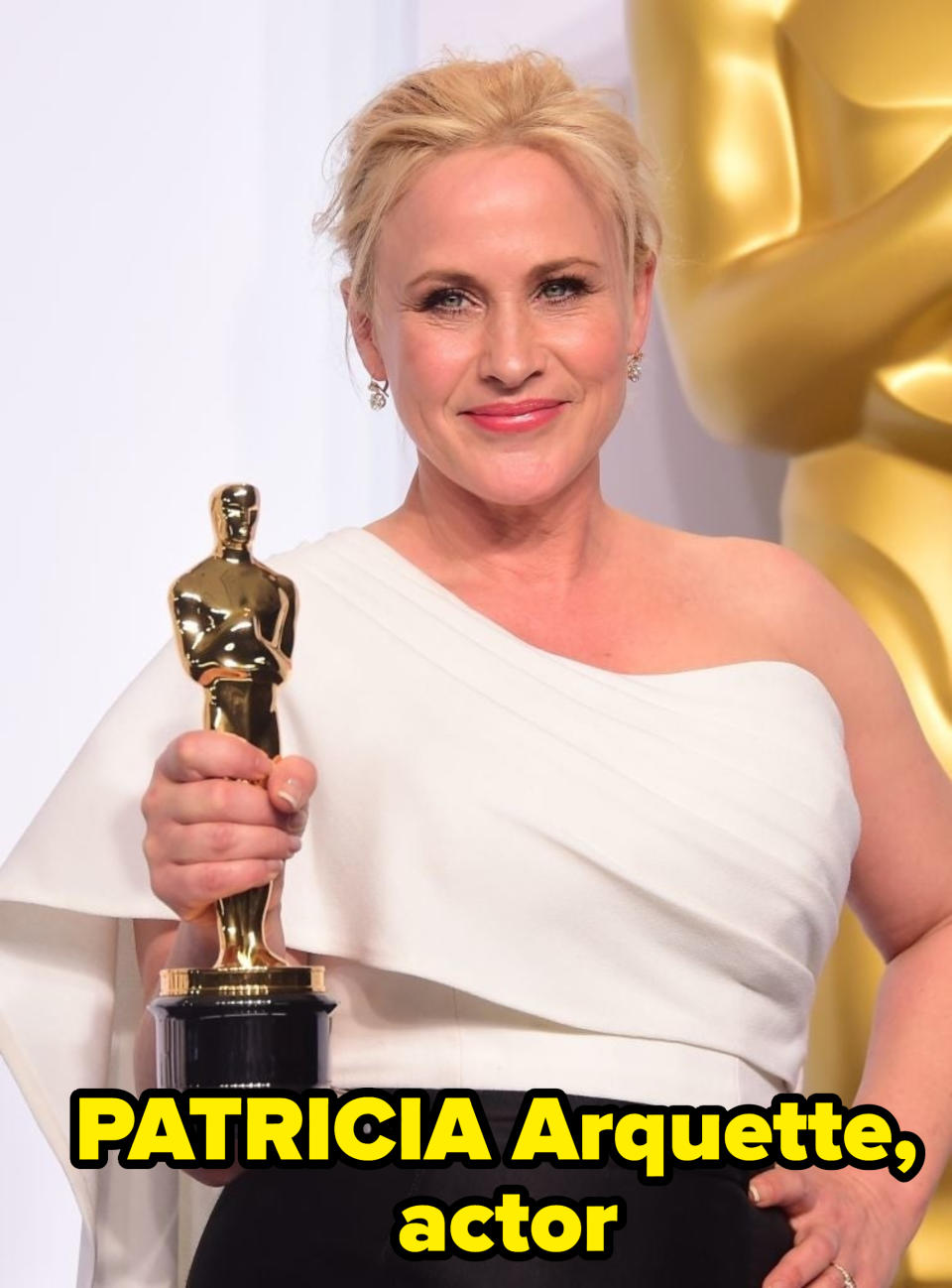 Patricia Arquette, actor, holding her Oscar