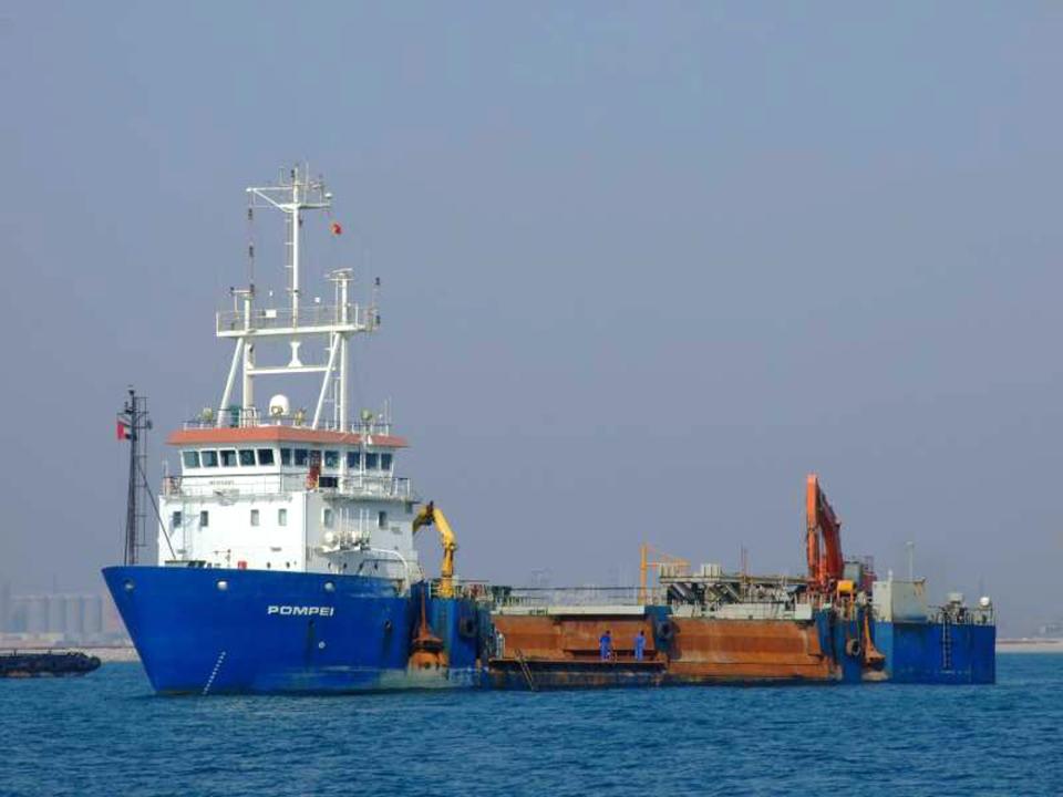 In this undated handout photo provided by the Belgian government, the Belgian ship Pompei, owned by De Nul, is shown in unidentified waters. One of Somalia's most notorious pirate leaders, Mohamed Abdi Hassan, was arrested in Brussels on Saturday, Oct. 12, 2013 and placed in custody pending charges, judicial sources said Monday. Hassan is suspected of the 2009 capture of the Belgian ship, the Pompei, which was held for over 70 days. (AP Photo/ Belgian Government)