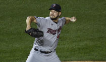 Minnesota Twins starting pitcher Rich Hill delivers against the Chicago Cubs during the first inning of a baseball game, Friday, Sept. 18, 2020, in Chicago. (AP Photo/David Banks)