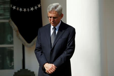 Judge Merrick Garland listens as U.S. President Barack Obama announces him as his nominee to the U.S. Supreme Court, in the Rose Garden of the White House in Washington D.C., March 16, 2016. REUTERS/Kevin Lamarque