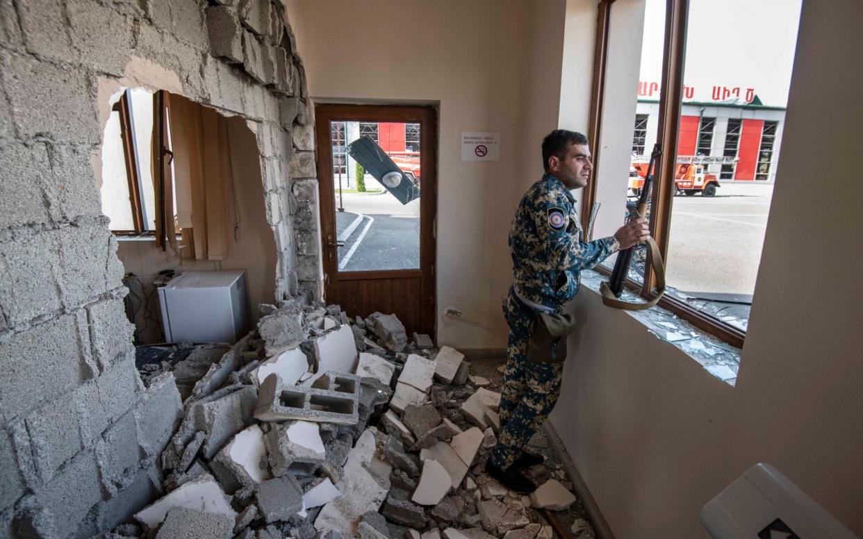 The fire station in Stepanakert was hit by a missile launched by Azerbaijani forces, causing damage and injuring a dozen people - Julian Simmonds/The Telegraph
