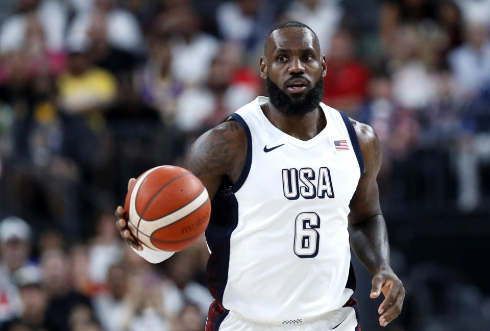 United States forward LeBron James (6) takes the ball up-court during the first half of an exhibition basketball game against Canada, Wednesday, July 10, 2024, in Las Vegas. (AP Photo/Steve Marcus)