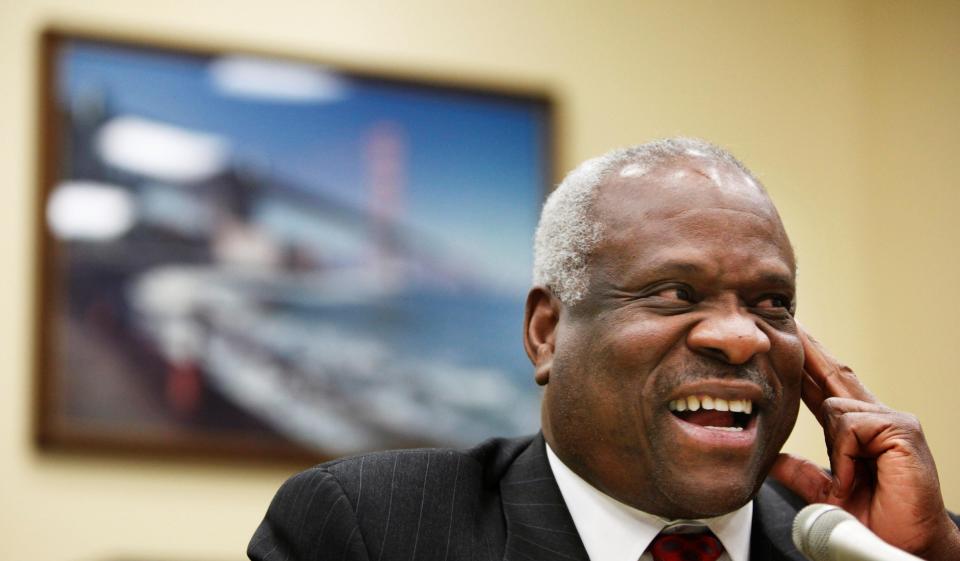 In this April 23, 2009 file photo, Supreme Court Justice Clarence Thomas testifies on Capitol Hill in Washington.