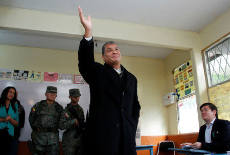 Ecuador's President Rafael Correa waves after casting his vote at school used as a polling station during the presidential election, in Quito, Ecuador April 2, 2017. REUTERS/Carlos Noriega