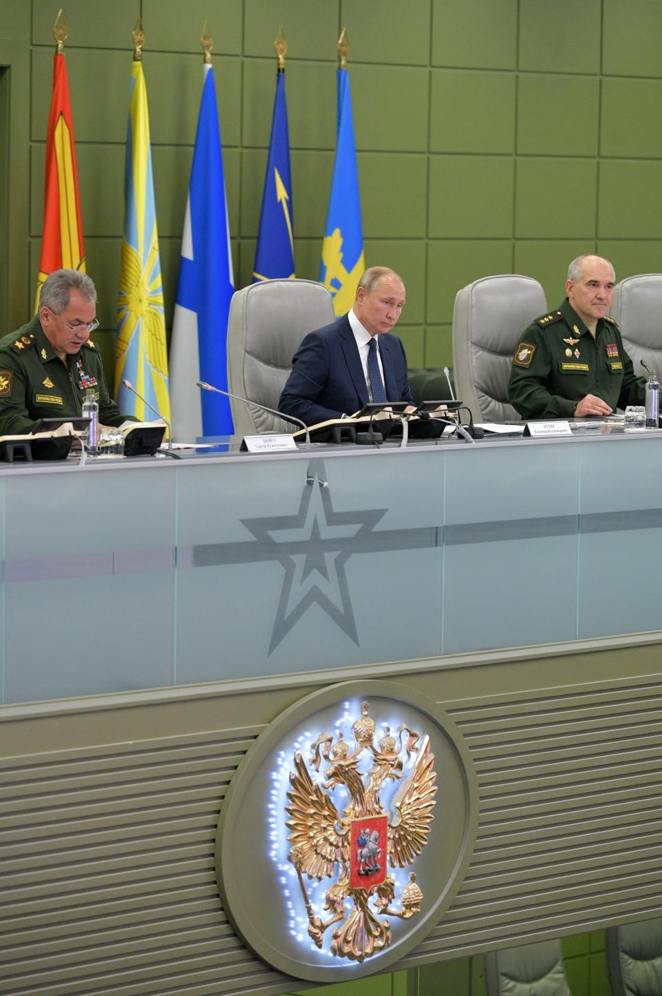 Russian President Vladimir Putin, center, Russian Defense Minister Sergei Shoigu, left, and The Head the Russian General Staff's Main Operational Department Col. Gen. Sergei Rudskoi attend a meeting in the Russian Defense Ministry in Moscow, Russia, Thursday, Oct. 17, 2019. (Alexei Druzhinin, Sputnik, Kremlin Pool Photo via AP)