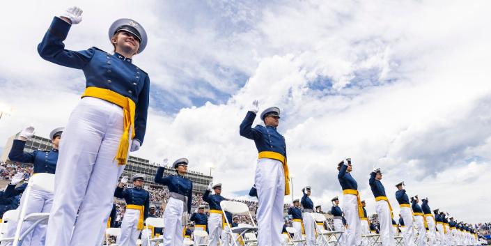 Members of the United States Air Force Academy Class of 2021 take their oath of office during a graduation ceremony at Falcon Stadium on May 26, 2021 in Colorado Springs, Colorado.