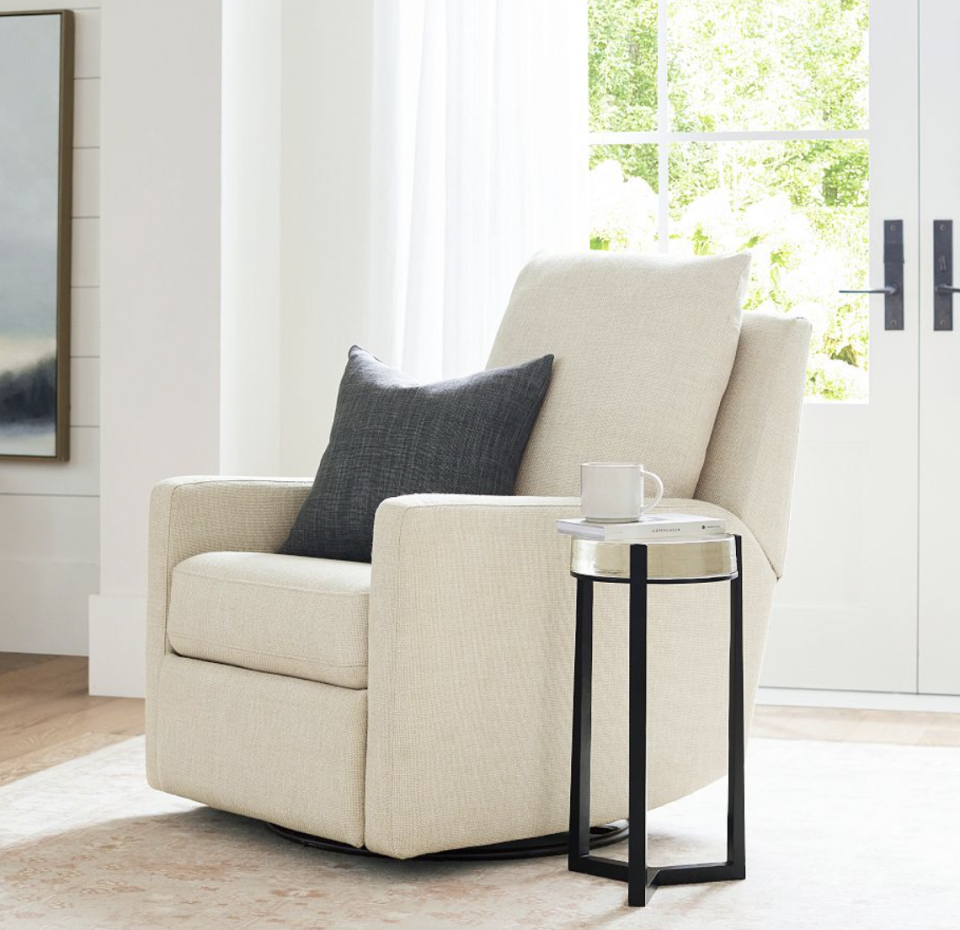 <p><a href="https://go.redirectingat.com?id=74968X1596630&url=https%3A%2F%2Fwww.potterybarn.com%2Fproducts%2Fayden-square-arm-upholstered-power-swivel-glider-recliner%2F&sref=https%3A%2F%2Fwww.womansday.com%2Fhome%2Fdecorating%2Fg46564393%2Fbest-recliners%2F" rel="nofollow noopener" target="_blank" data-ylk="slk:Shop Now;elm:context_link;itc:0;sec:content-canvas" class="link ">Shop Now</a></p><p>Ayden Square Arm Upholstered Recliner</p><p>potterybarn.com</p><p>$749.00</p><span class="copyright">Pottery Barn </span>