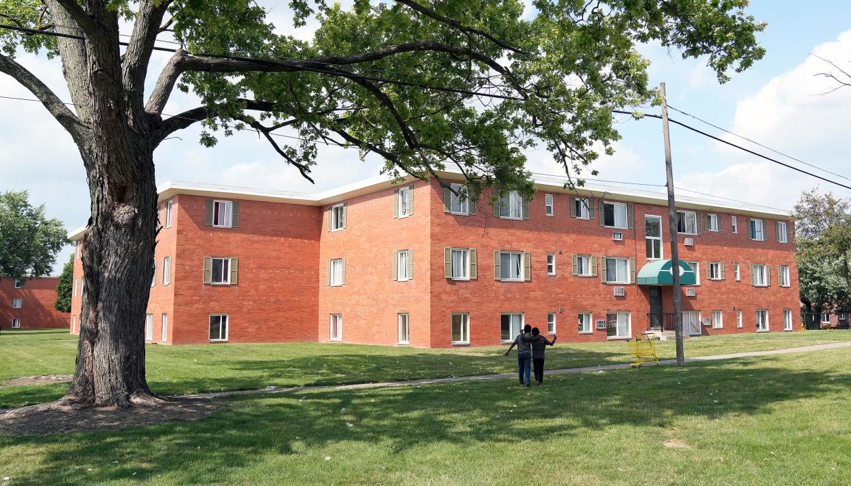 Two boys walk together outside Wedgewood Village Apartments on the city's West Side. In the early morning hours of June 23, 2022, Kassim Omar was shot in the back of the neck outside the part of the complex she lived in, paralyzing her from the neck down.