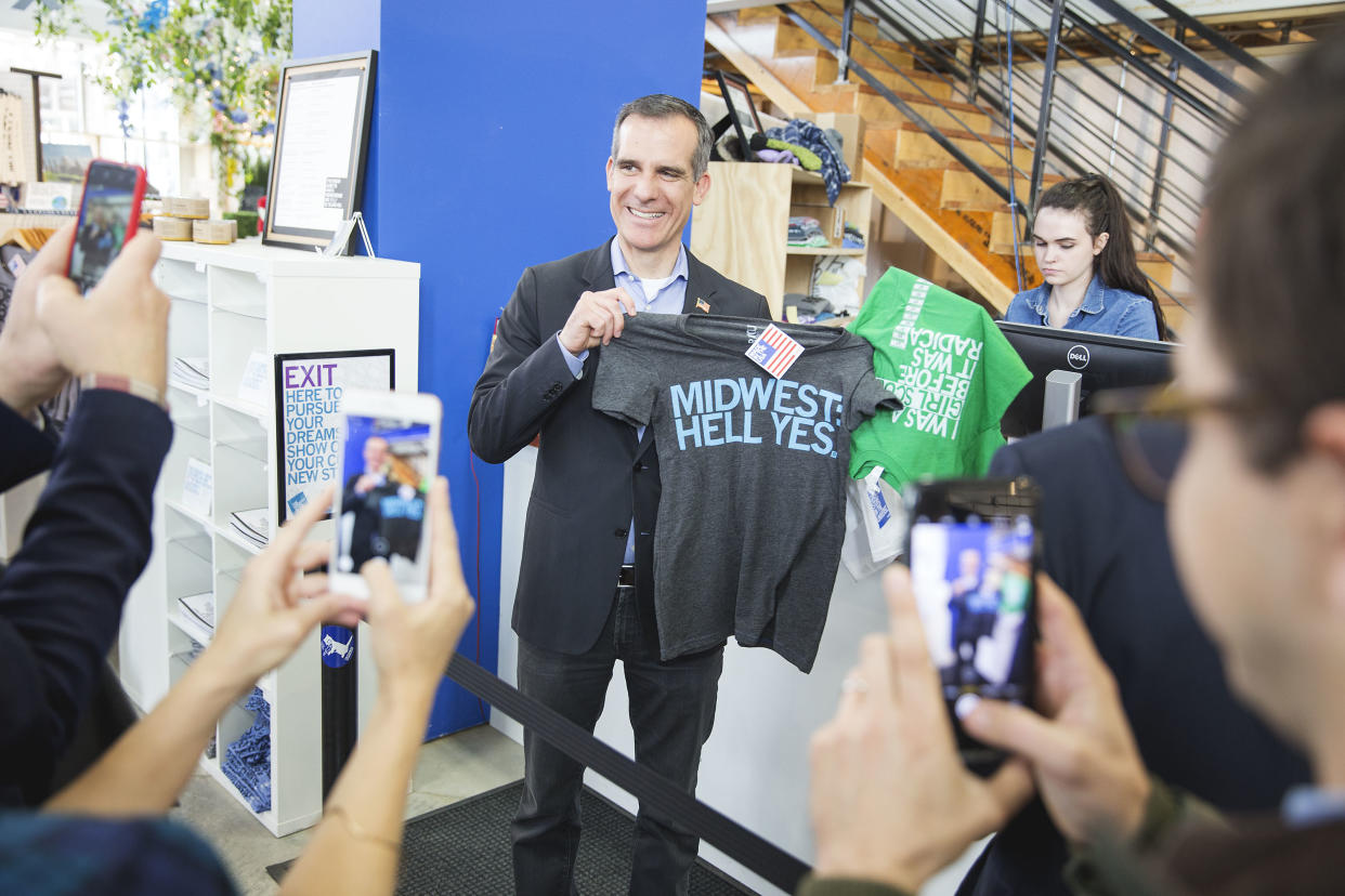 Los Angeles Mayor Eric Garcetti visits a Raygun clothing store in Des Moines during a tour of Iowa cities on April 13. (Photo: KC McGinnis for Yahoo News)