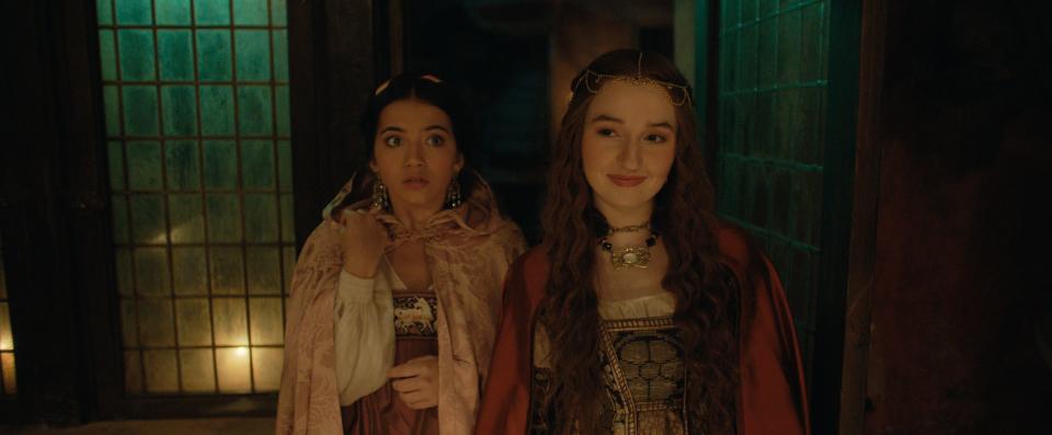Rosaline (Kaitlyn Dever, right) plots to win back Romeo from her cousin Juliet (Isabela Merced) in the Shakespeare-flavored comedy "Rosaline."