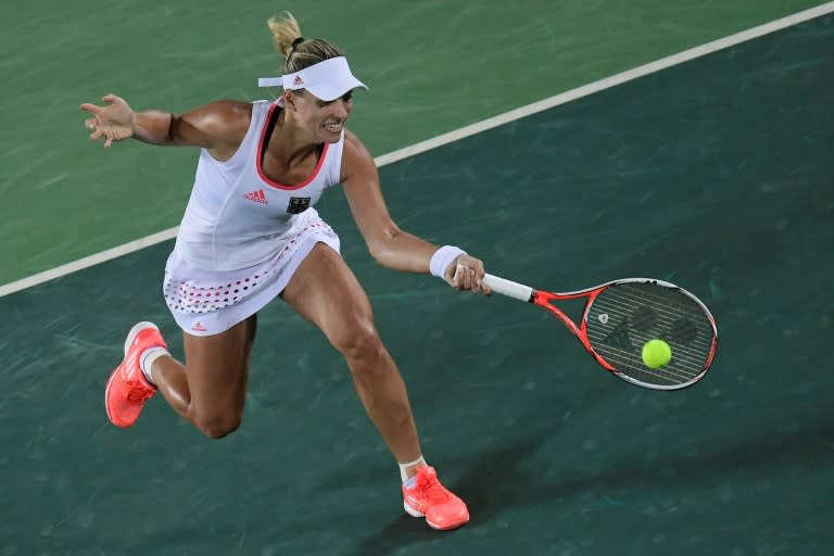 Germany's Angelique Kerber returns the ball to US player Madison Keys during their women's singles semi-final on August 12, 2016