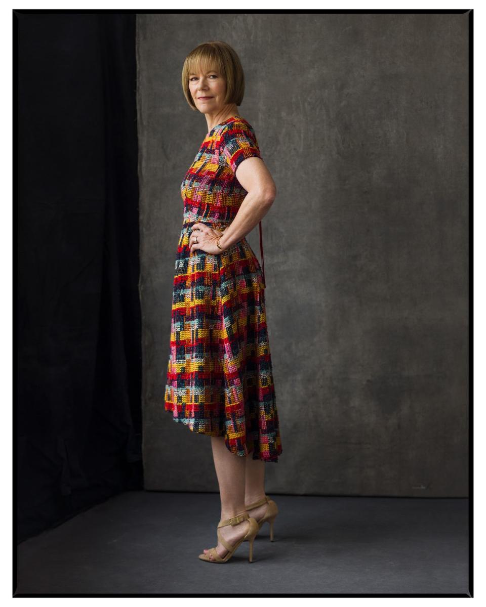 Photo credit: Tweed dress, Adam Lippes, $1,450. Gold bangle, Gabriel & Co., $460. Suede sandals, Jimmy Choo, $695. Stylist’s own bracelet. Her own ring. For details, see Shopping Guide.