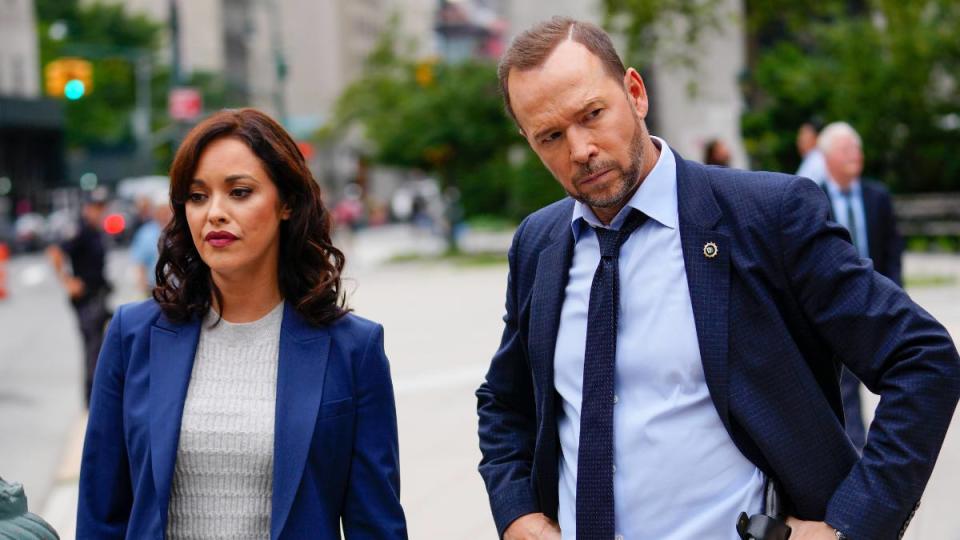 Man and woman filming tv show blue bloods