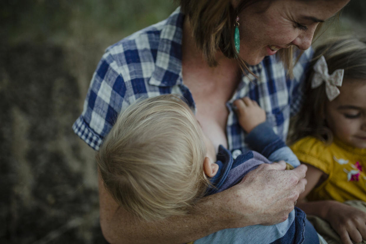 Some mums are shamed for breastfeeding in front of older siblings [Photo: Getty]