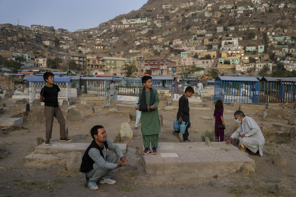 People fly kites in Kabul, Afghanistan, on Friday, Sept. 10, 2021. (AP Photo/Bernat Armangue)