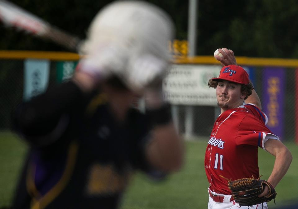 Zane Trace pitcher Dillon Hoover (11) fires in a pitch against a Unioto took on Zane Trace in boys baseball at Unioto High School on April 26, 2024, in Chillicothe, Ohio. Unioto defeated Zane Trace 4-1.