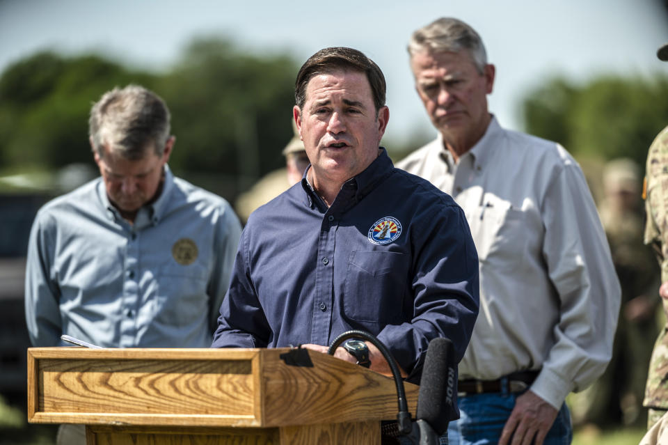Doug Ducey, governor of Arizona, speaks during a news conference in Mission, Texas, on Oct. 6, 2021. (Sergio Flores / Bloomberg via Getty Images flie)