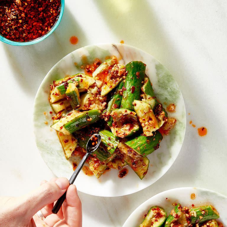 chili oil smashed cucumbers on a plate
