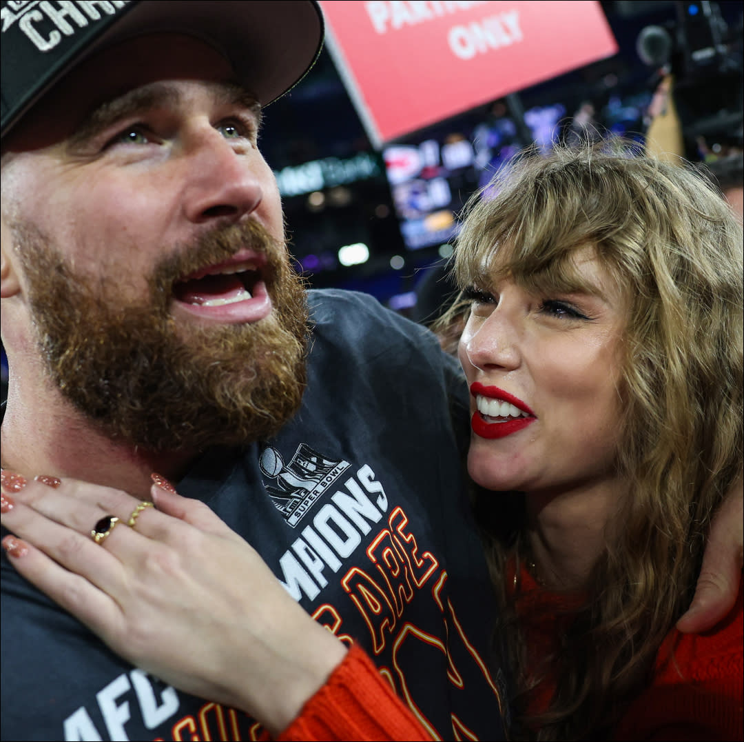  Ravis Kelce #87 of the Kansas City Chiefs (L) celebrates with Taylor Swift after defeating the Baltimore Ravens in the AFC Championship Game at M&T Bank Stadium on January 28, 2024. 