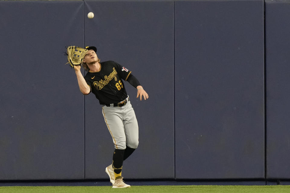 Pittsburgh Pirates center fielder Jack Suwinski catches a ball hit by Miami Marlins' Luis Arraez during the first inning of a baseball game, Thursday, June 22, 2023, in Miami. (AP Photo/Wilfredo Lee)