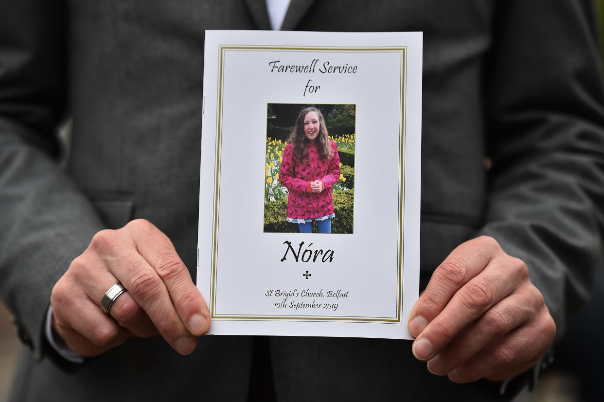 BELFAST, NORTHERN IRELAND - SEPTEMBER 10: The order of service card can be seen as the funeral of Nora Quoirin takes place at St Brigid's Church, Derryvolgie Avenue on September 10, 2019 in Belfast, Northern Ireland. The 15 year old went missing on August 3rd while on holiday with her family at the Dunsun resort in Malaysia. Her body was later discovered close to a waterfall less than two miles from the resort following a ten day search. (Photo by Charles McQuillan/Getty Images)