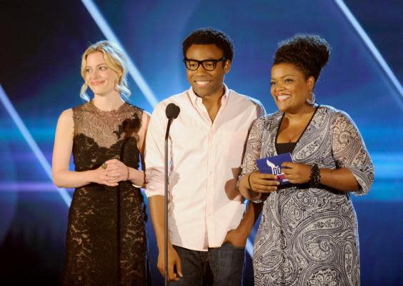 Gillian Jacobs, Donald Glover and Yvette Nicole Brown speak onstage at the 2010 VH1 Do Something! Awards (Getty)