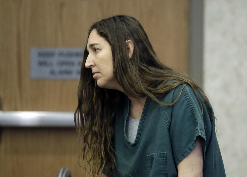 Megan Huntsman, accused of killing six of her babies and storing their bodies in her garage, appears in court Monday, April 28, 2014, in Provo, Utah. Prosecutors have filed six first-degree murder charges against Huntsman. (AP Photo/Rick Bowmer, Pool)