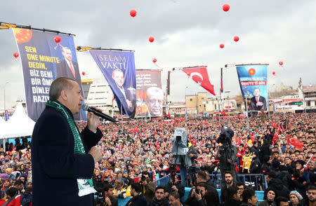 Turkish President Tayyip Erdogan addresses his supporters in Konya, Turkey, December 17, 2018. Cem Oksuz/Presidential Press Office/Handout via REUTERS