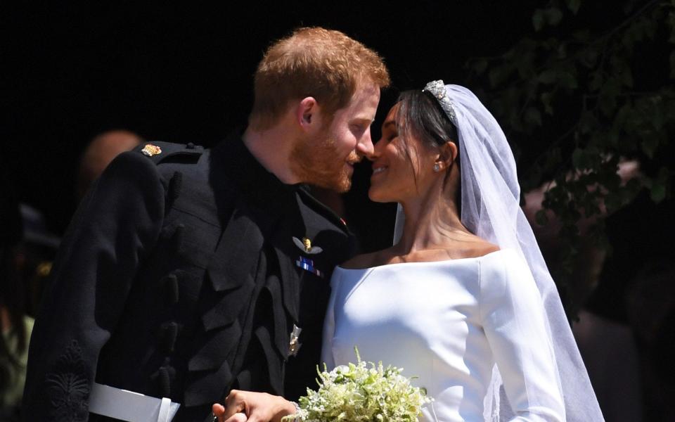 Prince Harry and Meghan Markle celebrate their Windsor Castle wedding - REX