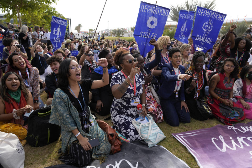 Demonstrators participate in a sit-in calling for reparations for loss and damage at the COP27 U.N. Climate Summit, Thursday, Nov. 17, 2022, in Sharm el-Sheikh, Egypt. (AP Photo/Peter Dejong)