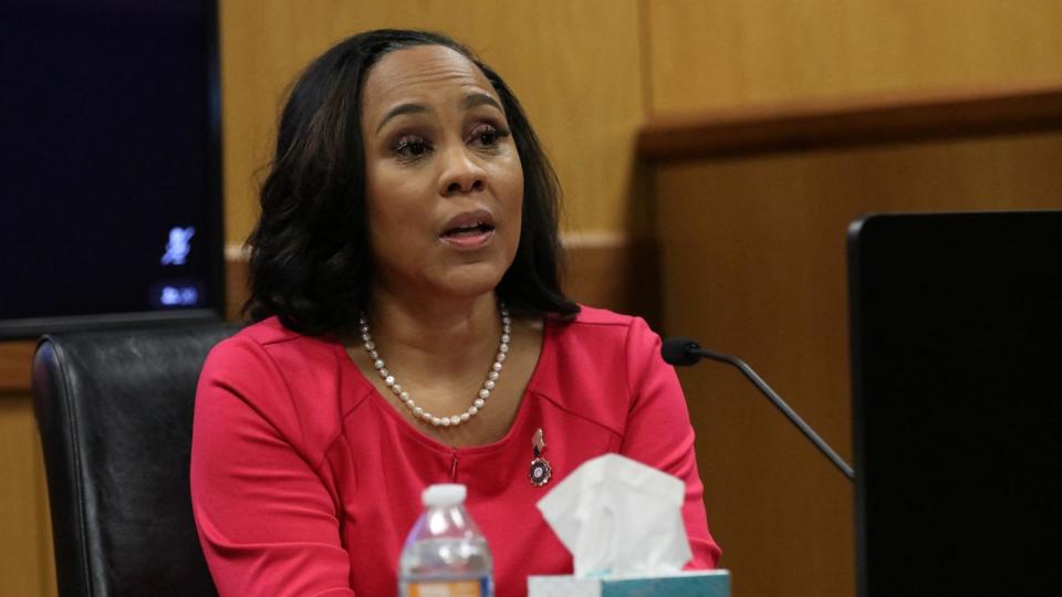 PHOTO: Attorney Fani Willis speaks from a witness stand during a hearing in the case of State of Georgia v. Donald John Trump at the Fulton County Courthouse in Atlanta, Feb. 15, 2024.  (Alyssa Pointer, Pool/Reuters)