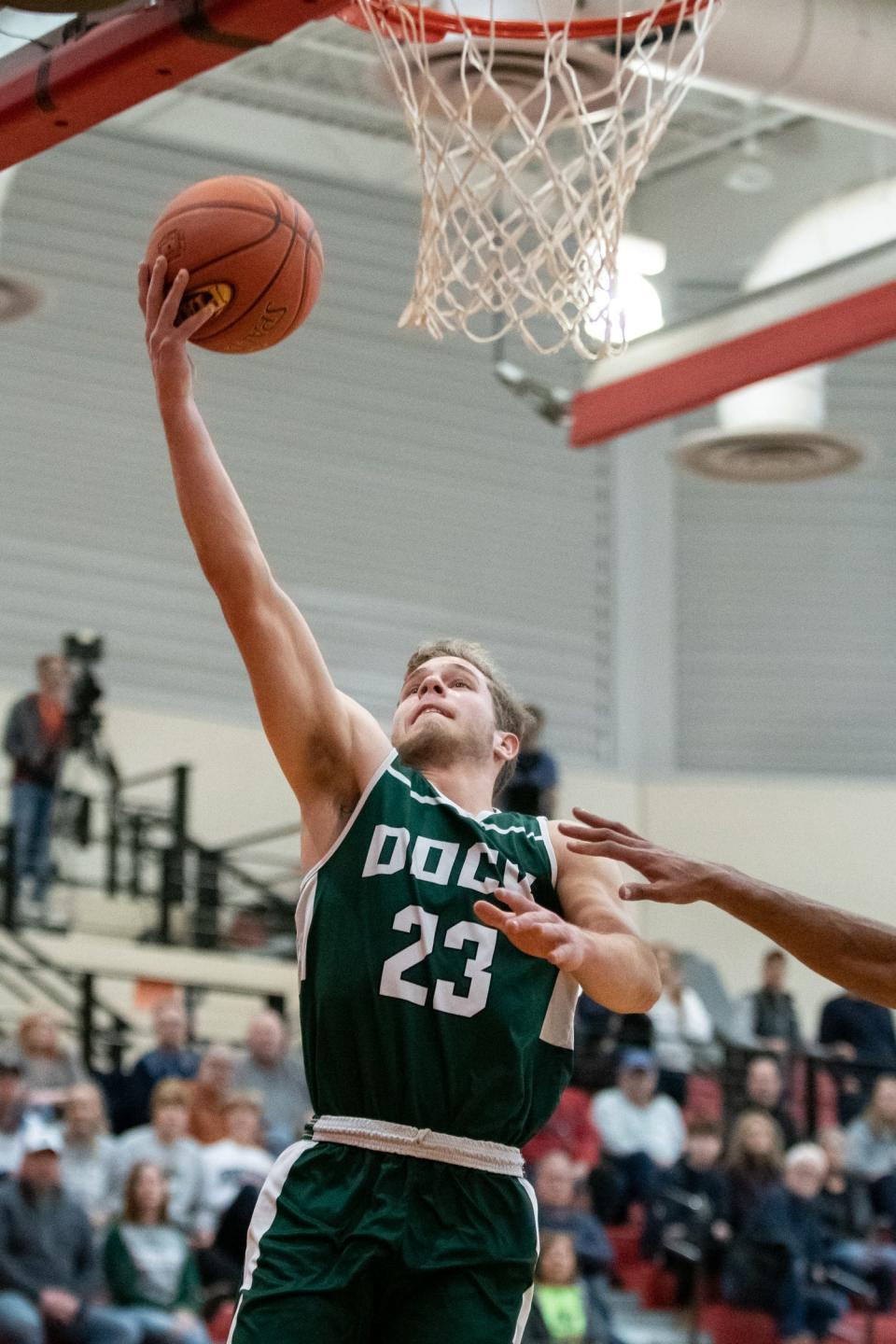 Dock Mennonite's Nathan Lapp shoots a layup in last season's District One/11 Class 3A Championship game. Lapp is closing in on his 1,000th career point.
