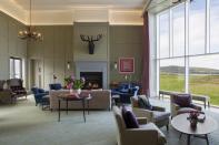 <p>Set in the dunes of Islay on a seven-mile stretch of pristine sandy beach, <a href="https://www.booking.com/hotel/gb/machrie-amp-golf-links-port-ellen.en-gb.html?aid=2070935&label=coastal-retreats" rel="nofollow noopener" target="_blank" data-ylk="slk:The Machrie Hotel;elm:context_link;itc:0;sec:content-canvas" class="link ">The Machrie Hotel</a> is connected to a private footpath which takes you on beautiful oceanic walks to hidden coves and beaches - all of which can often be enjoyed in complete solitude. There are over 70 walking or cycling routes along the coast, inland, uphill or through the mountains. </p><p>Islay's rugged landscapes are perfect for wildlife-spotting, with the 130 miles of coastline offering opportunities to see seals, otters, deer, puffins and sea eagles. Islay also lies within the Hebridean Whale Trail, so you could take a boat tour in search of dolphins, basking sharks, minke whales and orcas.</p><p>What's more, golf fans will be more than happy with the 18-hole course at Machrie, which overlooks the immaculate beach, where kids can build sandcastles.. There's something for everyone here.</p><p><a class="link " href="https://www.booking.com/hotel/gb/machrie-amp-golf-links-port-ellen.en-gb.html?aid=2070935&label=coastal-retreats" rel="nofollow noopener" target="_blank" data-ylk="slk:CHECK AVAILABILITY;elm:context_link;itc:0;sec:content-canvas">CHECK AVAILABILITY</a></p>