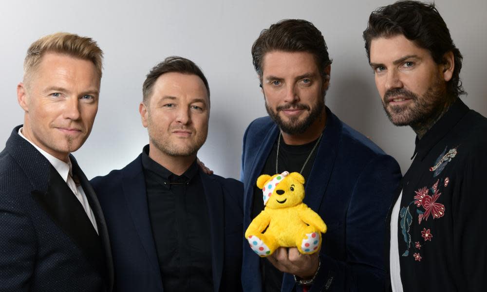 Boyzone with Pudsey the bear backstage at BBC Children in Need.