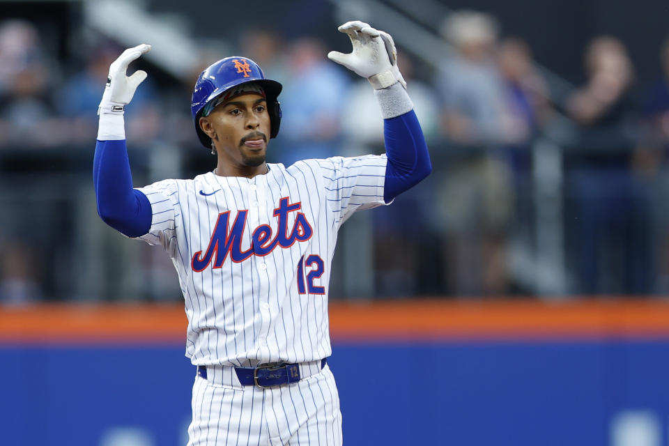 New York Mets' Francisco Lindor gestures after his double against the Miami Marlins during the first inning of a baseball game Wednesday, June 12, 2024, in New York. (AP Photo/Rich Schultz)